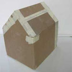 4. The big house shape, edges and corners strengthened with masking tape, ready for covering with white paper. House-box-007c.jpg