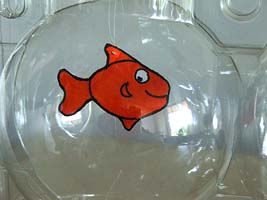 Each fish is hanging by a thread from the top of the box Small card fishes swimming in an apple box aquarium