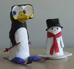 Penguin and snowman Penguin made from an egg box and a paper cup