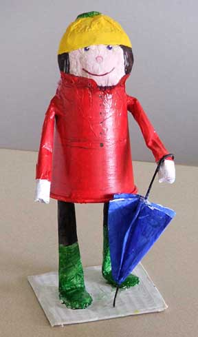 Girl with umbrella (made from a paper cup) Girl with umbrella (made from a paper cup)